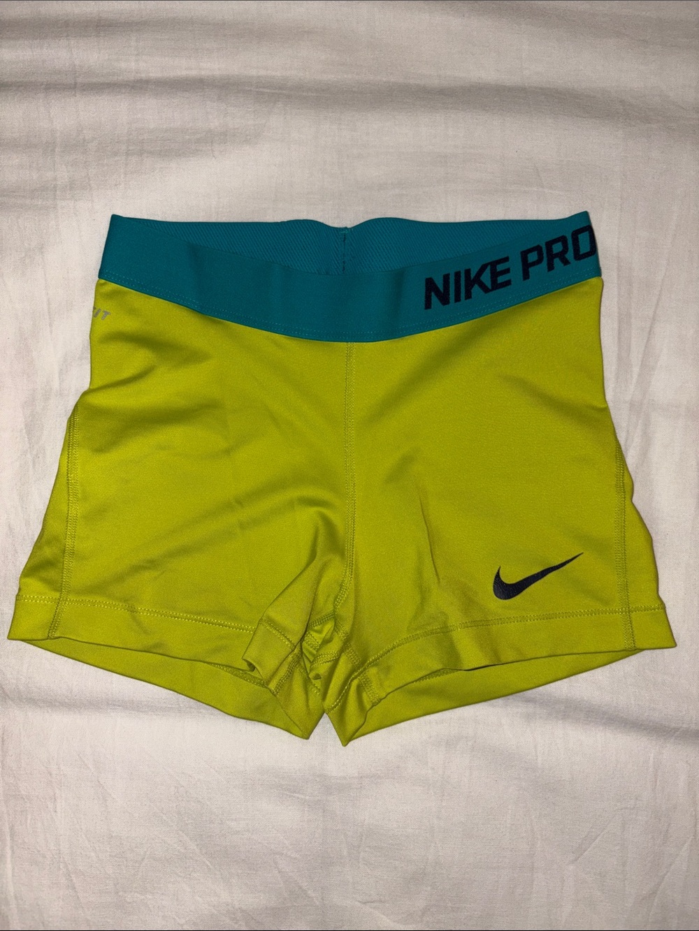 Nike Women's Lime Green Compression Bike Shorts with Teal Waistband